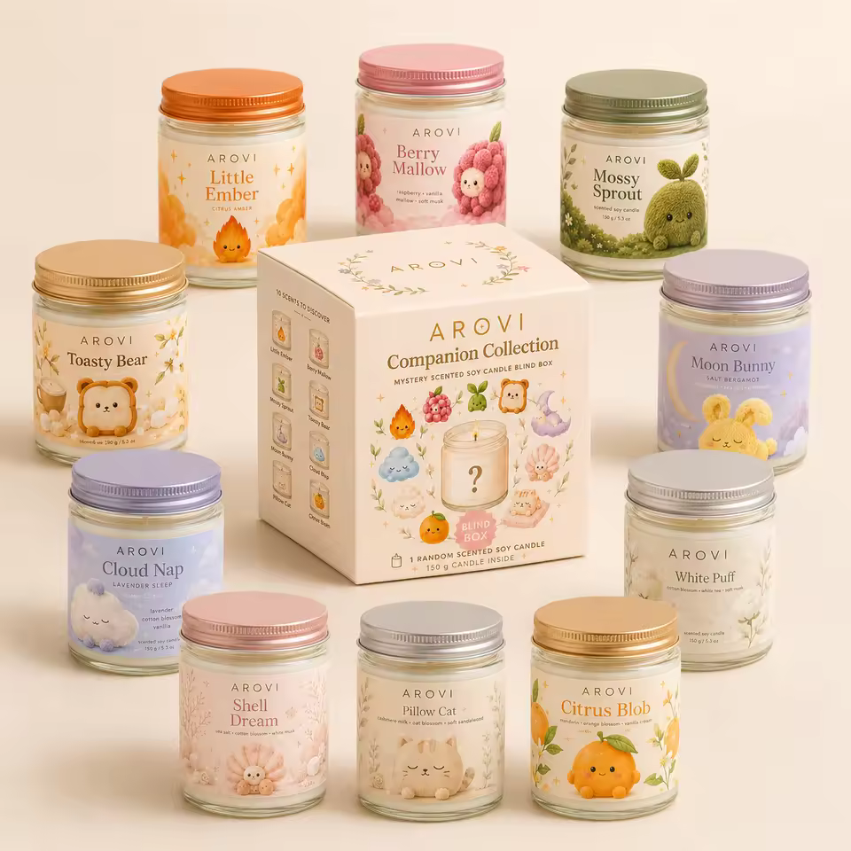 Illustrated character scented candle collection showing coordinated 150g glass-jar candles, metal lids, and gift packaging