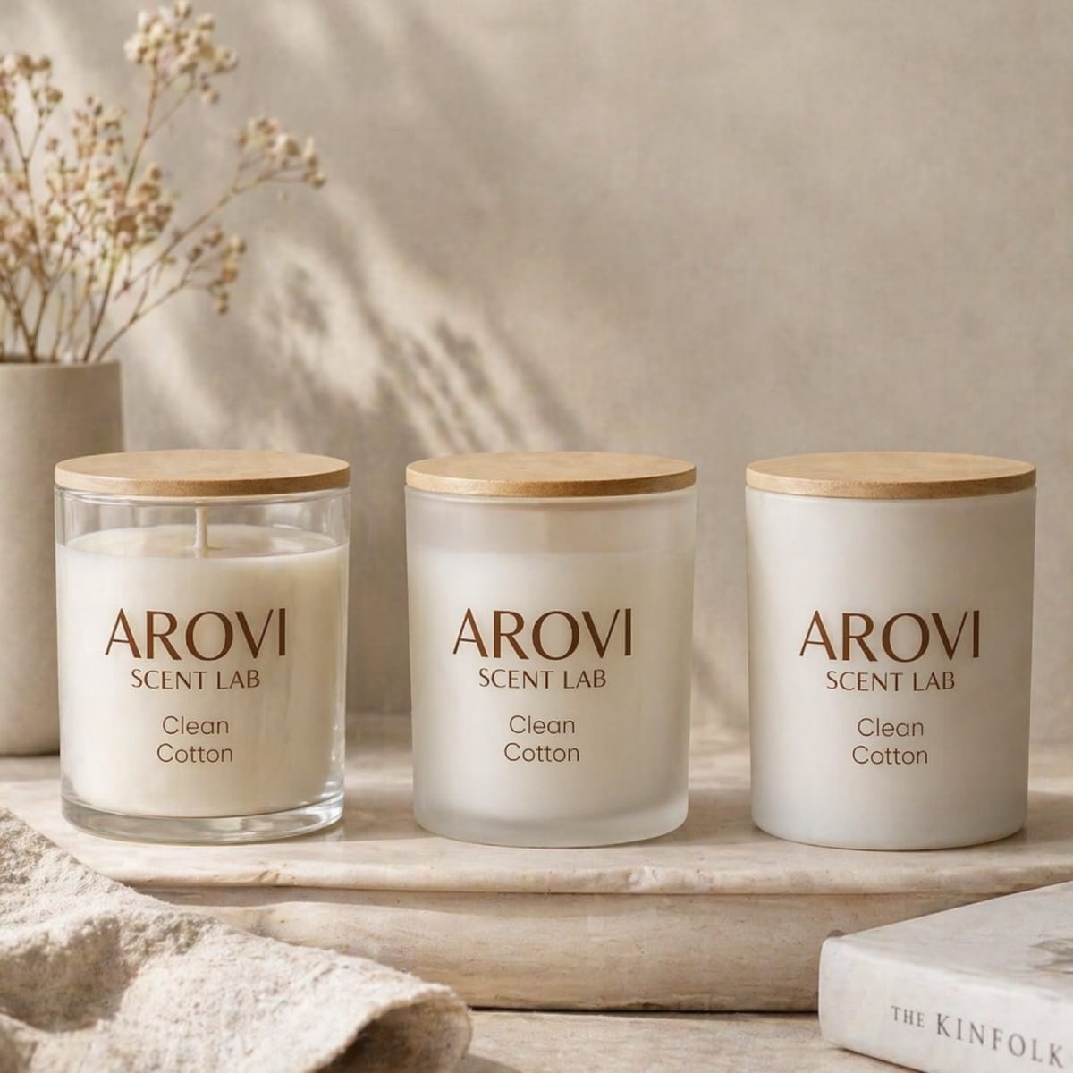 Three neutral glass candle finishes with flat lids
