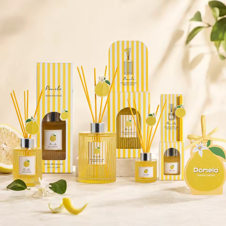 Pomelo home-fragrance collection with 50ml, 150ml and 200ml reed diffusers, scented-paper air freshener, and coordinated packaging
